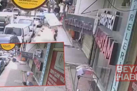 Gaziosmanpaşa’da takmaya çalıştığı tabelayla kaldırımda bekleyen kişinin üzerine düştü