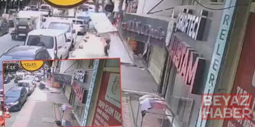 Gaziosmanpaşa’da takmaya çalıştığı tabelayla kaldırımda bekleyen kişinin üzerine düştü