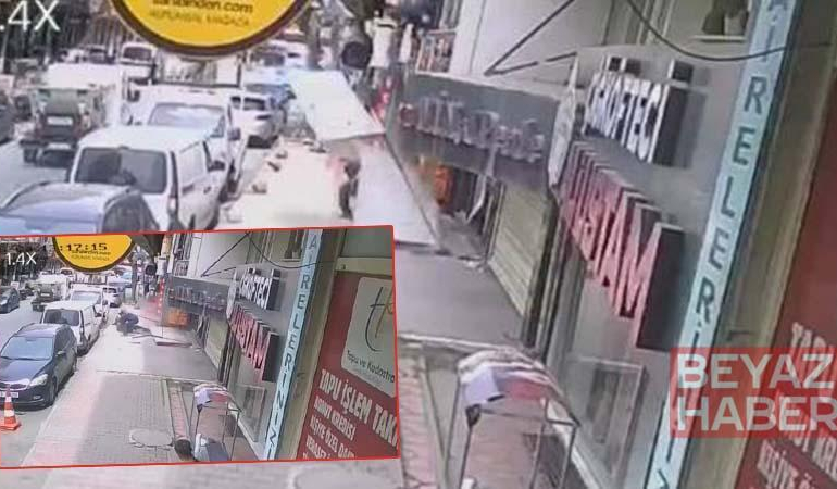 Gaziosmanpaşa’da takmaya çalıştığı tabelayla kaldırımda bekleyen kişinin üzerine düştü