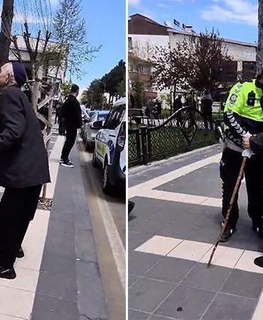 Kendisini yolun karşısına geçiren trafik polisini yanaklarından öptü