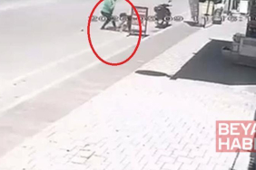 2 yaşındaki çocuğu, sokak ortasında tekmeledi