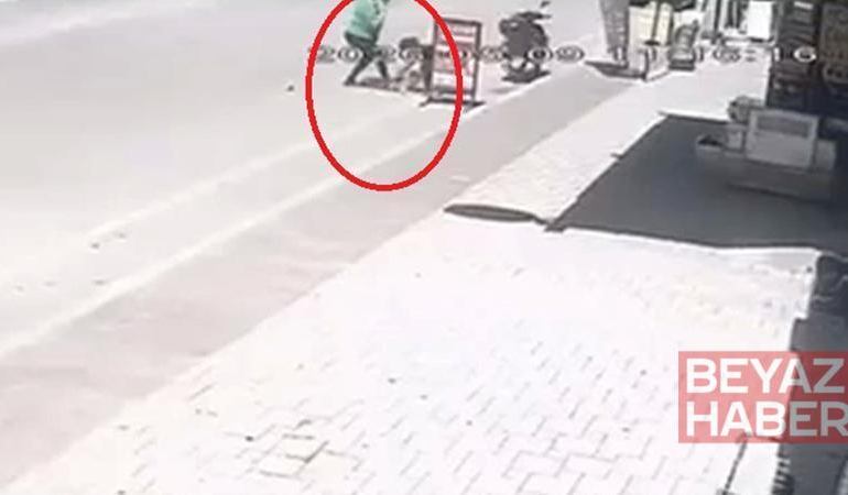 2 yaşındaki çocuğu, sokak ortasında tekmeledi