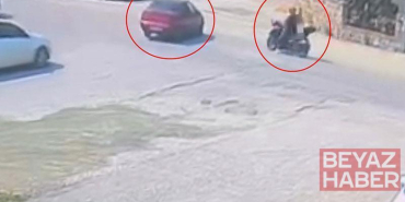 Otomobil ile çarpışan motosikletin sürücüsü yaralandı; kaza anı kamerada