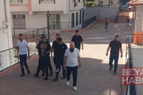 Hamile eşi ile üvey çocuklarını darbetti