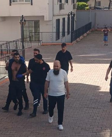 Hamile eşi ile üvey çocuklarını darbetti