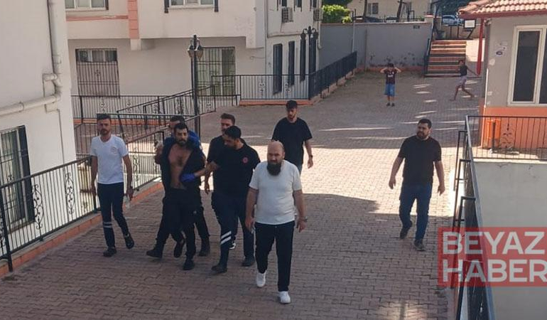 Hamile eşi ile üvey çocuklarını darbetti