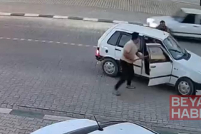 Yolunu kesen kuzenleri tarafından demir çubuklarla dövüldü; olay kamerada
