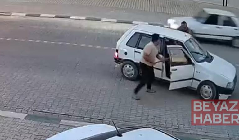 Yolunu kesen kuzenleri tarafından demir çubuklarla dövüldü; olay kamerada