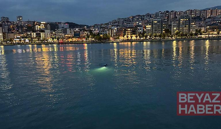 Ekipleri harekete geçiren deniz kıyısındaki eşyalar, profesyonel yüzücünün çıktı