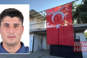 Şehit polis memurunun babaevine Türk bayrağı asıldı