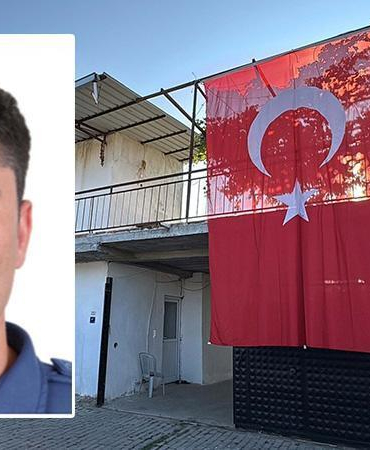 Şehit polis memurunun babaevine Türk bayrağı asıldı