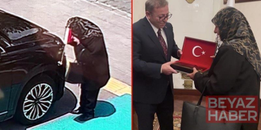 Makam aracındaki bayrağı öptü, Vali Polat bayrak hediye etti