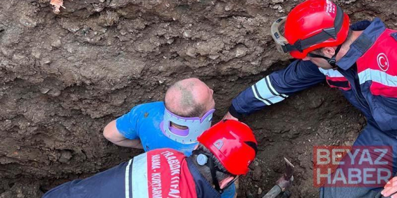 Göçükte, vücudunun bir bölümü toprak altında kalan işçi kurtarıldı