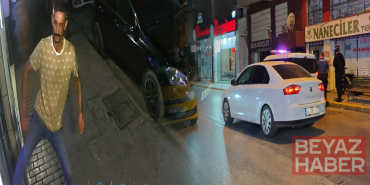 İş yerinin camını tekmeyle kıran şüpheliyi esnaf yakaladı!