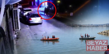 Simsiyah kıyafetler giyip, sabah 03.40'ta kol kola denize yürümüşler