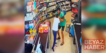 Mersin’de, markette çocuğa darp kamerada