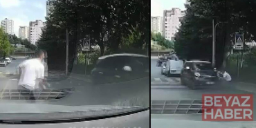 Başakşehirde yokuştan kayan aracı fark edip otomobilinden inerek koştu; kaputundan tutarak durdurdu