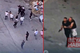 Taziye evindeki kavgada silah çekip husumetlilerini kovaladı