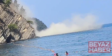 Denizde yüzerken 200 metre mesafede heyelan meydana geldi; o anlar kamerada