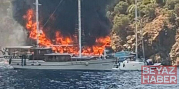 Fethiye’de koydaki tekne yandı, 115 yolcu suya atladı