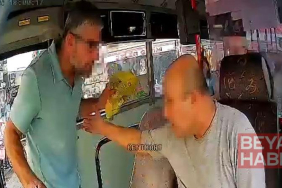 Otobüs şoförü ile otomobil sürücüsü arasındaki tartışma kamerada