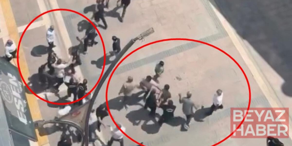 Sokak bir andan karıştı! Tekmeler yumruklar hava uçuştu