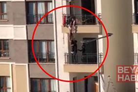 Balkondan düşmek üzere olan kız çocuğunu katları tırmanarak kurtardı