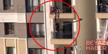 Balkondan düşmek üzere olan kız çocuğunu katları tırmanarak kurtardı