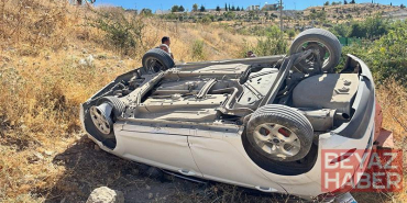 Şarampole yuvarlanan otomobildeki karı-koca yaralandı