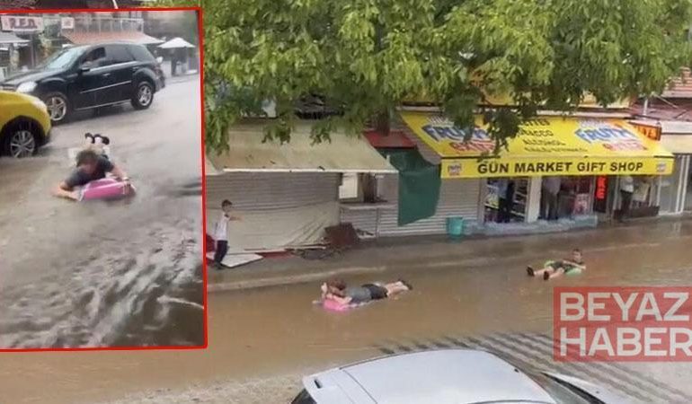 Şişme yataklarla sel sularında yüzdüler
