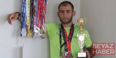Şanlıurfalı atlet ekmek parası için inşaatta, şampiyonluk için pistte ter döküyor