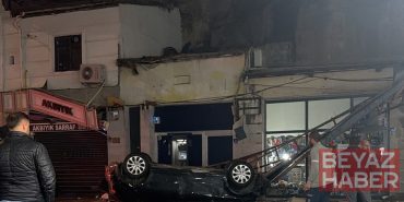 Otomobil 50 metreden iş yerlerinin üzerine düştü