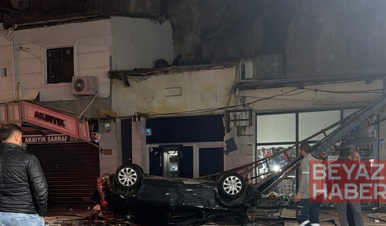 Otomobil 50 metreden iş yerlerinin üzerine düştü