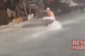Su baskınıyla mücadele eden esnaf akıntıya kapılmaktan son anda kurtuldu